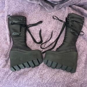 Knee High Obsidian Pocket Platform Boots from Dolls Kill
